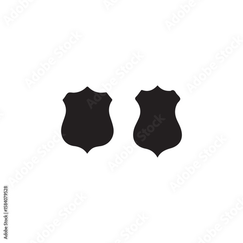 Two Simple Black Shield Shapes Isolated on White.This image features two identical, solid black shield shapes against a plain white background.