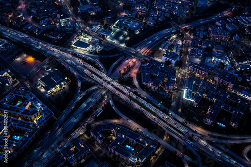 Night Aerial View of a Los Angeles Freeway Interchange and Illuminated City Blocks