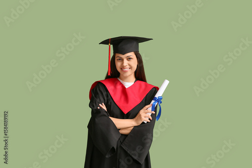 Happy female graduate with ...