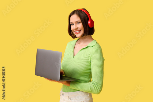 Beautiful young woman in he...