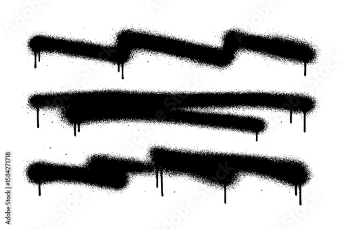 Isolated black spray paint strokes with grunge texture and drips