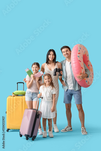 Family of tourists with swi...