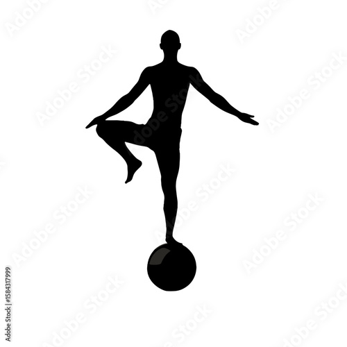 Silhouette of a man balancing on one leg atop a sphere  