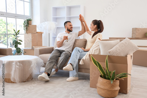 Young couple with key from ...