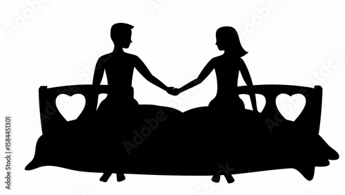 Silhouette of a couple holding hands sitting on a bed with heart shaped cutouts on the headboard design
