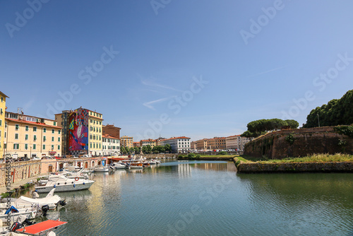 Bild auf Leinwand The playground area (area giochi) and view of the New Fortress (Fortezza Nuova) in Livorno, Italy