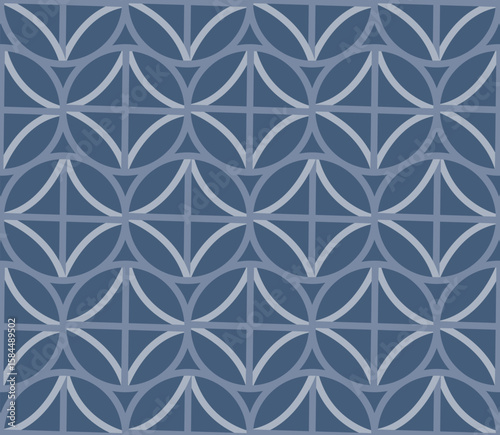 Interlocking Circles Pattern in Navy and Light Blue Seamless Geometric Design for Textile Wallpaper or Background
