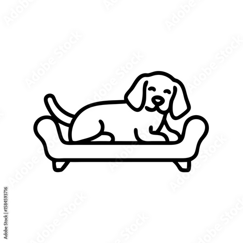 Beagle dog lying on a couch in a relaxed position  