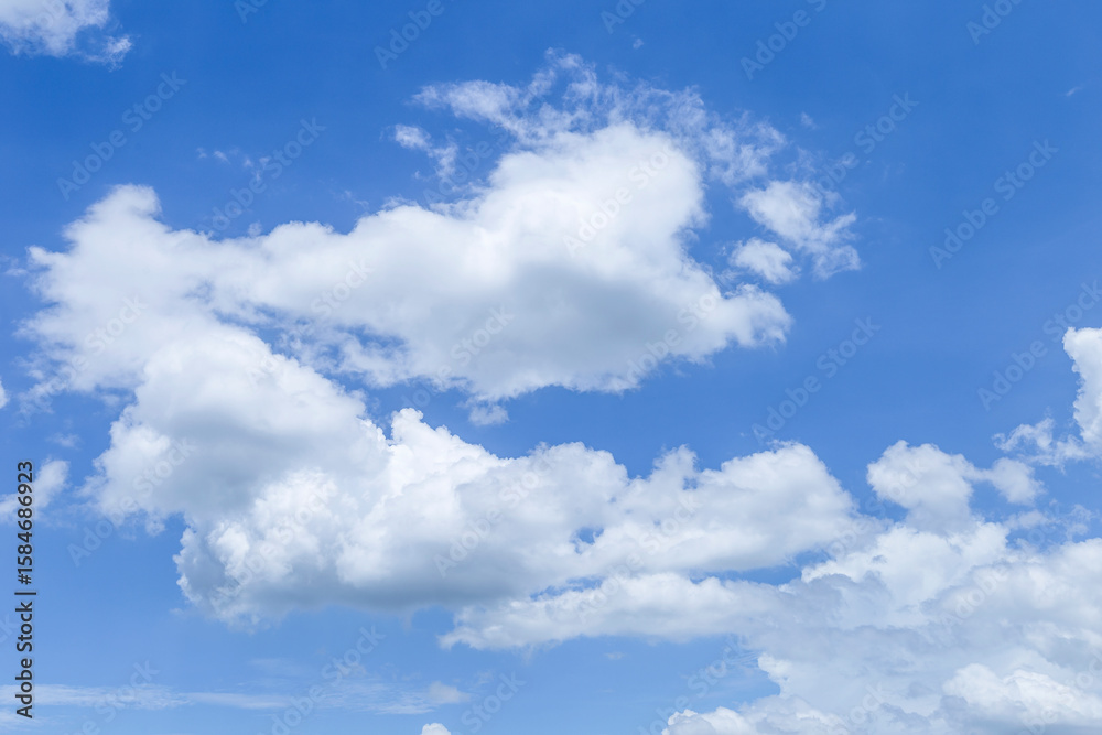 White cloud floating over blue sky, weather and nature background White cloud floating over blue sky, weather and nature background