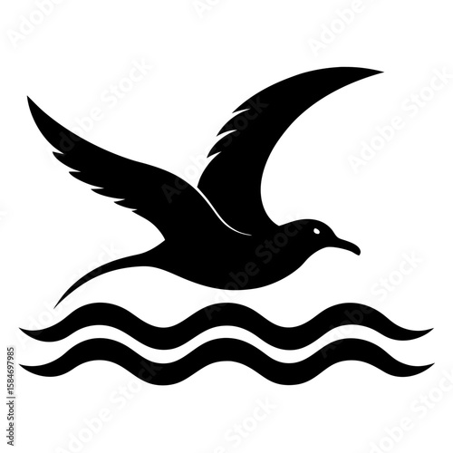 Elegant silhouette of a seagull soaring gracefully above ocean waves