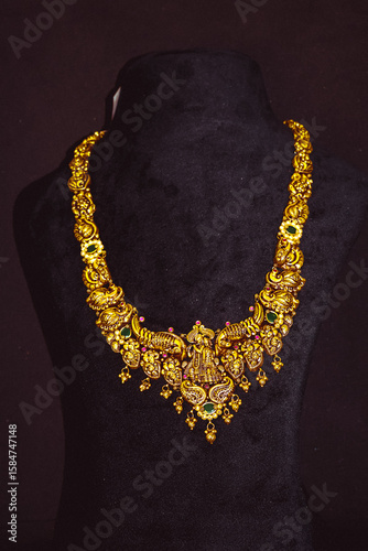 Traditional Pure Gold ornaments with marvelous stones and intricate designs. Temple Gold Jewellery.  Gold Haram necklaces for special occasions. Gold Harams or haarams.
