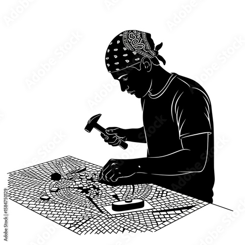 Silhouette of a person working on a mosaic tile project, concentrating on the task.