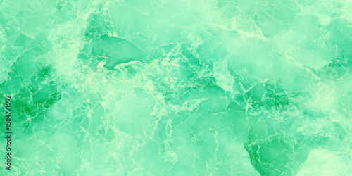 Marbled surface with a vibrant green color scheme, It features swirling patterns and delicate veins in shades of lime green and yellow, The effect is reminiscent of polished stone.