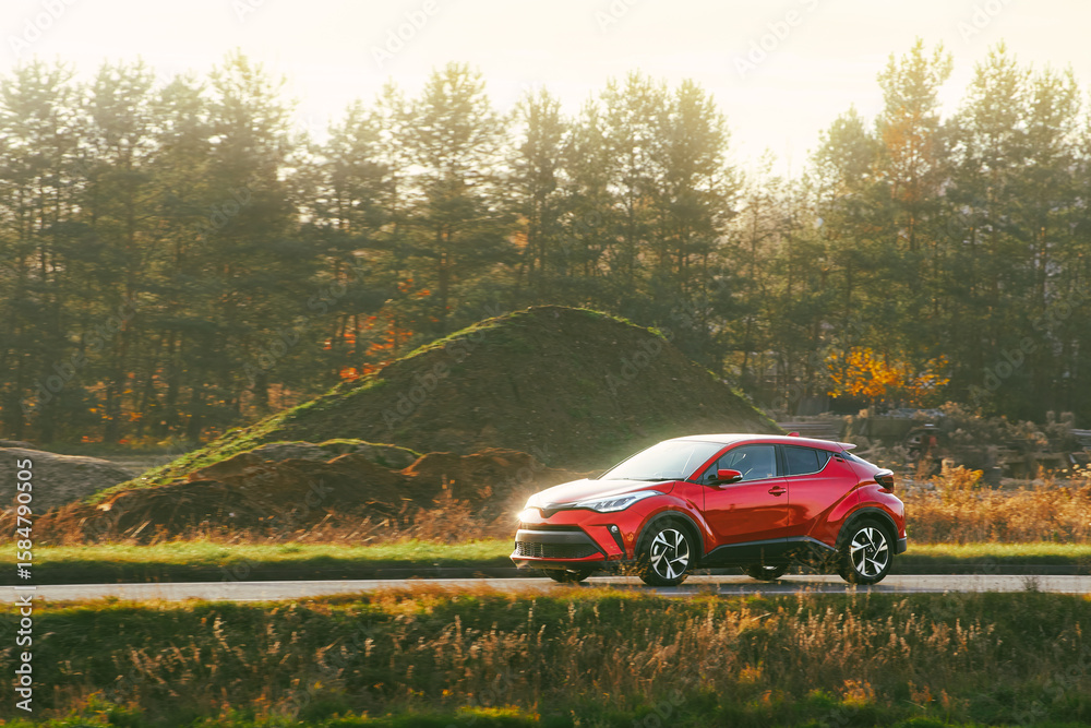 Fototapeta premium Eco-friendly automobile driving outdoors