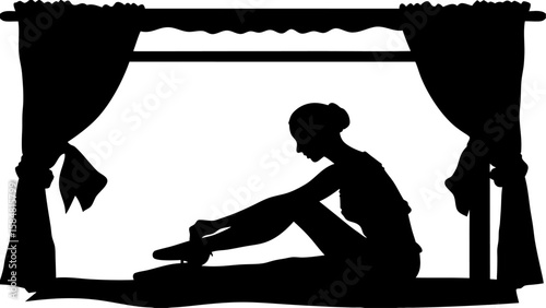 Silhouette of a woman tying her ballet shoes on a bed with curtains in a dark and moody scene