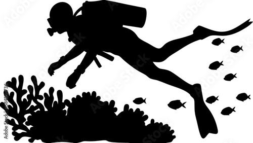 Silhouette of a scuba diver exploring coral reef with several fish swimming nearby in the ocean water