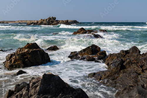 Fototapeta Naklejka Na Ścianę i Meble -  breaking waves and rocks at the sea
