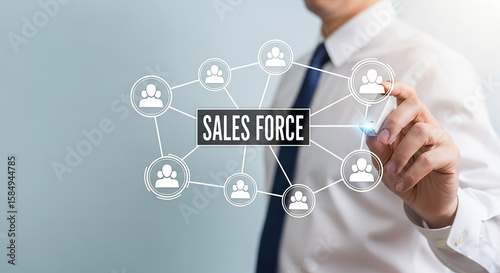 Man in shirt interacting with salesforce network diagram on a light blue background showing connections