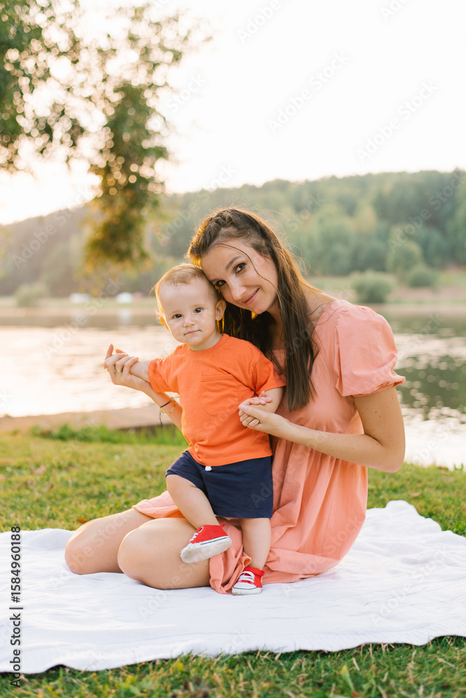 Fototapeta premium Happy Toddler Standing With Mother