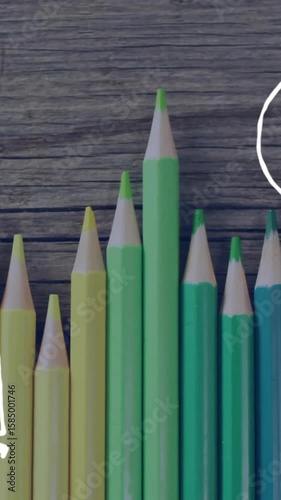 In school, colorful pencils arranged with animation of math symbols and equations