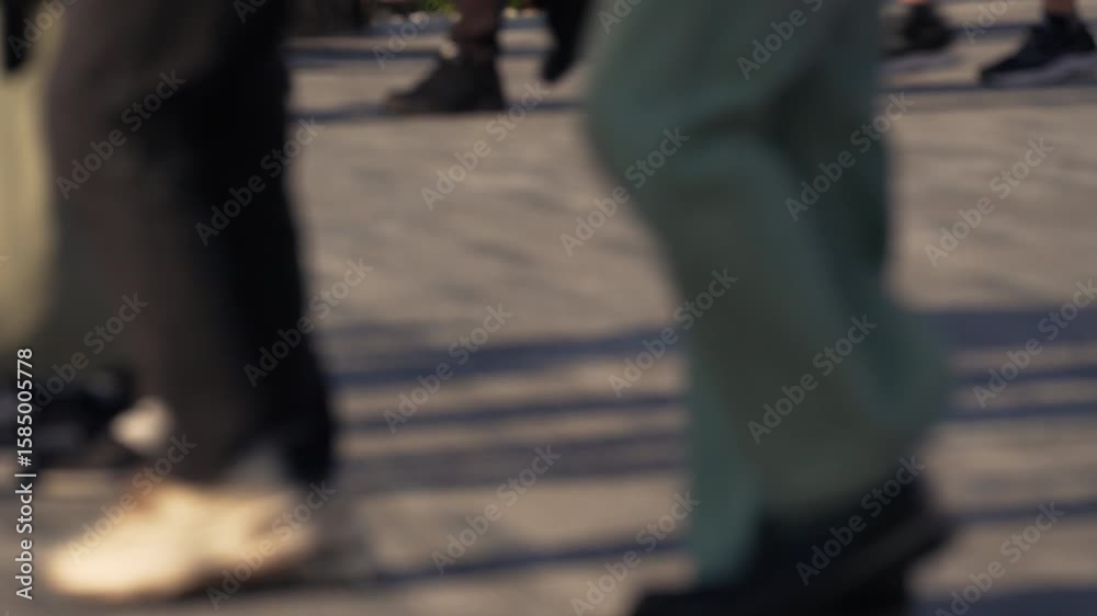 Close up of people walking on crowded street in slow motion. Close up of people walking on crowded street in slow motion.