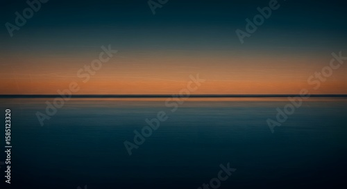 Vast Ocean Horizon at Sunset with Gradual Transition of Colors Over Calm Water Surface