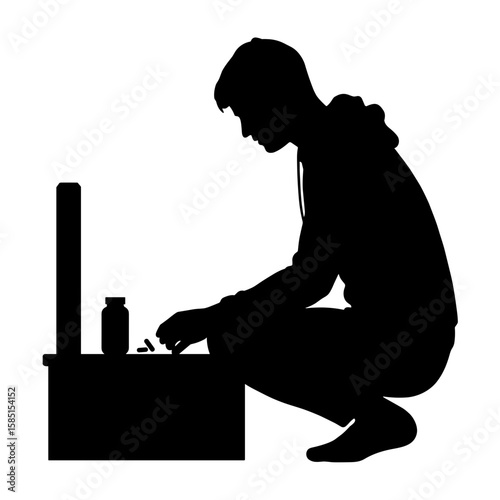 Silhouette of person organizing pills on nightstand – Nighttime care routine