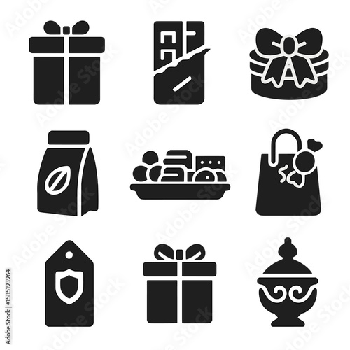Luxury Snack Icons. Solid style icons of luxury and gift snacks: gourmet box icon, wrapped premium chocolate, ribboned cookie tin,