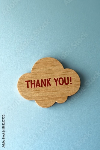 Wallpaper Mural Digital art, speech bubble with the text "THANK YOU!" cut out, minimalistic design on a soft blue background, Torontodigital.ca