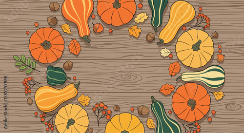 Beautiful autumn harvest wreath decoration with pumpkins gourds and leaves on wooden background