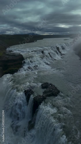 Wallpaper Mural Witness the breathtaking waterfall pouring over rocky cliffs, creating mist and rainbows against the dramatic Iceland scenery. Gullfoss waterfall Iceland Torontodigital.ca