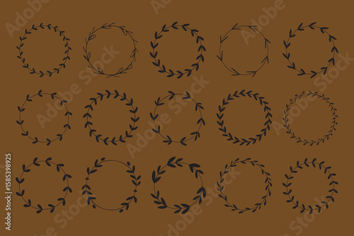 Collection of delicate hand drawn black floral wreaths and botanical circular frames on a brown background