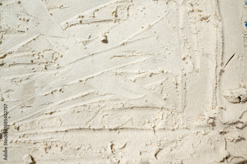 Obraz premium Closeup view of sand with abstract texture. Beach scene. Summer concept. Top view
