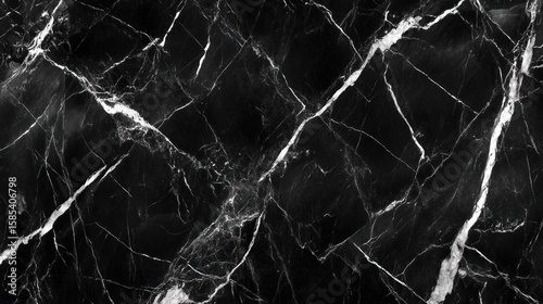 Black marble texture with white veins
