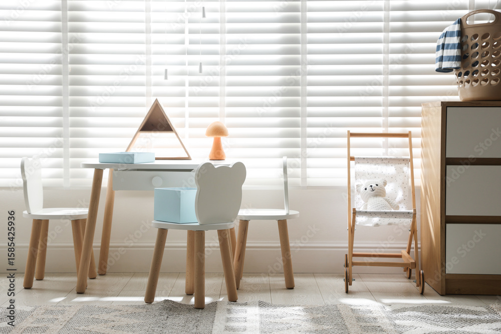 Fototapeta premium Stylish playroom with decor and furniture. Interior design
