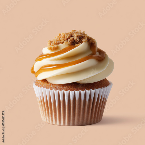 close-up of caramel cupcake with swirled frosting and caramel drizzle, caramel crumble, chocolate cupcake with cream