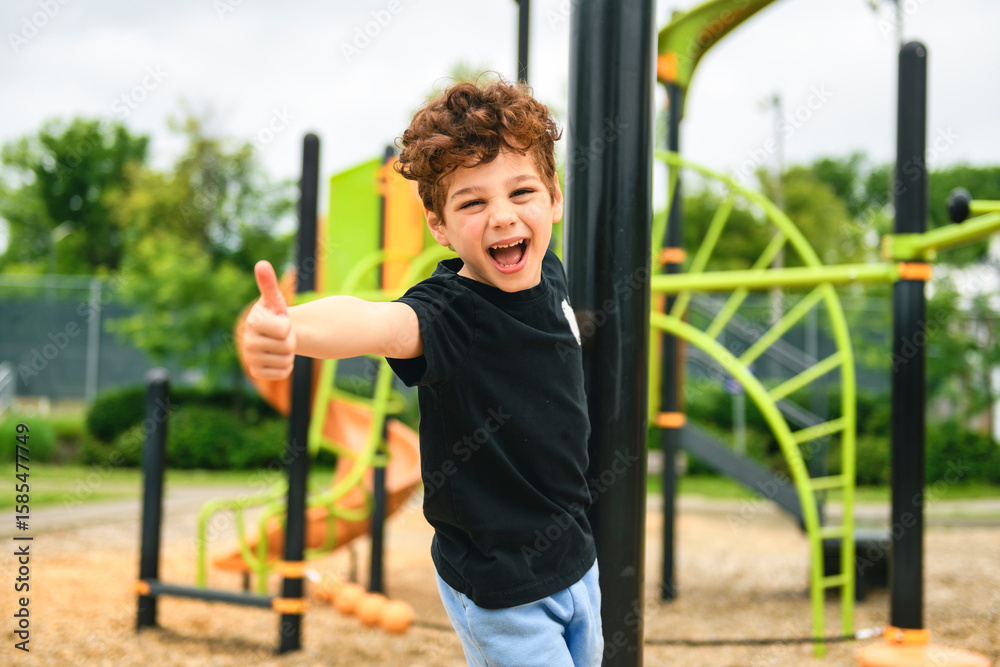 Fototapeta premium Happy kid on playground on summer season