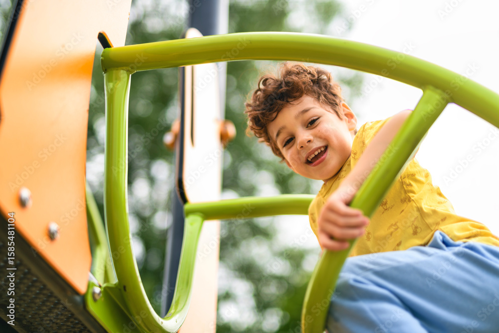 Fototapeta premium Happy kid on playground on summer season