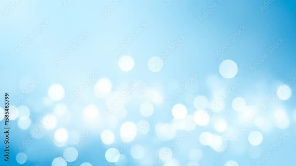 Gentle blue bokeh background with shimmering lights, perfect for dreamy and serene visuals