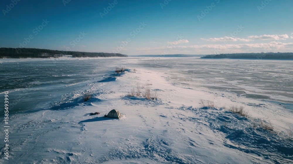 Fototapeta premium Frozen river expanse, snowy shoreline