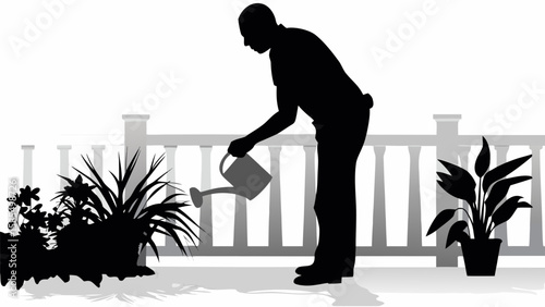 Silhouette of a man watering plants on a patio with a white railing in the background outdoors