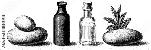 Engraved spa elements and stones with essential oils for relaxation and wellness