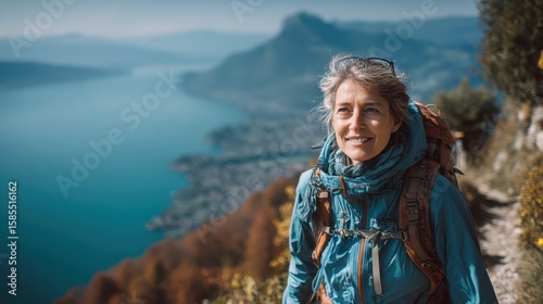 Mature Woman Hiking Overlooking Lake