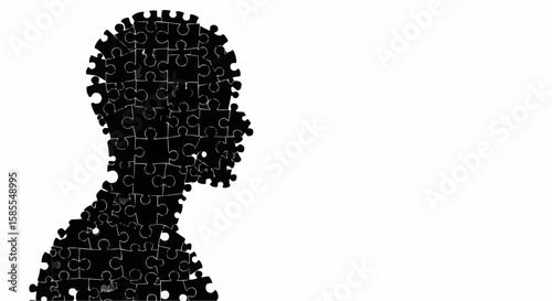 Silhouette of a person's head and shoulders made of black puzzle pieces on a white background