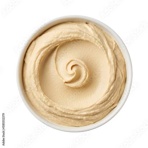 Smooth creamy hummus dip in white bowl