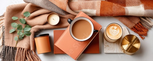 Wallpaper Mural Cozy flat lay with warm drinks, candle, and book on a blanket Torontodigital.ca