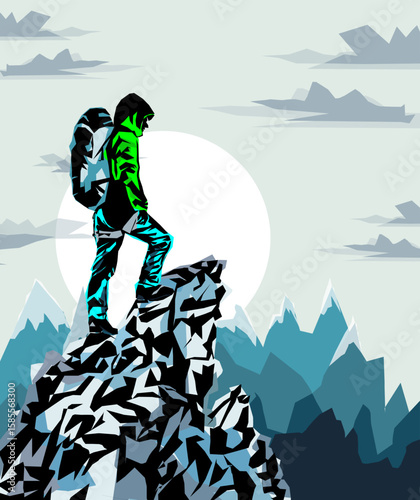 Man on the top of the mountain looks at the beautiful landscape of the mountains.