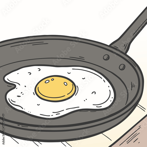 A close up of a fried egg with a bright yellow yolk cooking in a gray skillet on a light surface top