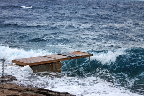 waves crashing on rocks