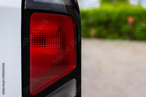 Close-Up of a Cars Red Taillight - background automotive